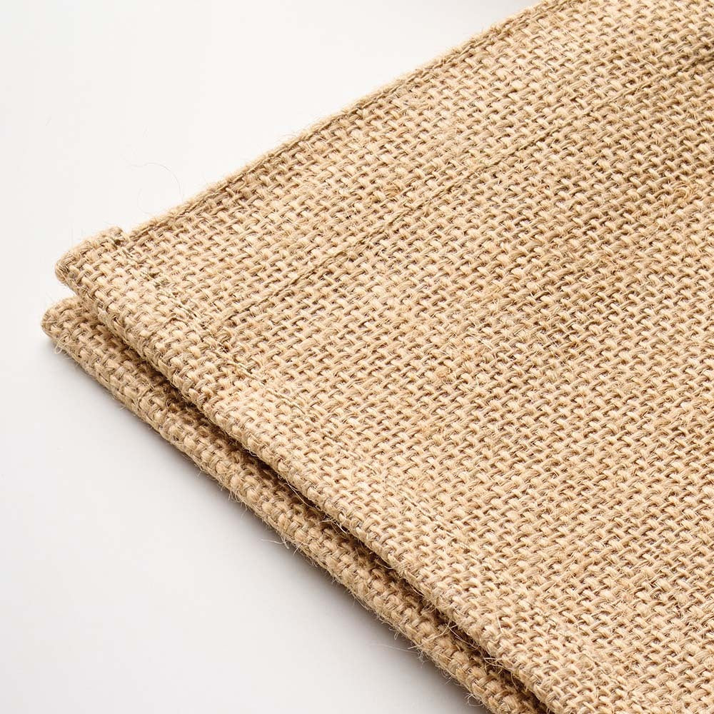 Primer plano de la textura del yute laminado de la bolsa tote, material resistente y de aspecto natural