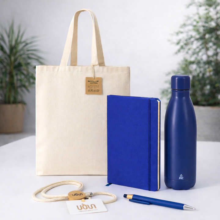 Pack sostenible para ferias y eventos en color azul con bolsa, bidón, libreta, bolígrafo y lanyard para regalos de empresa sostenibles