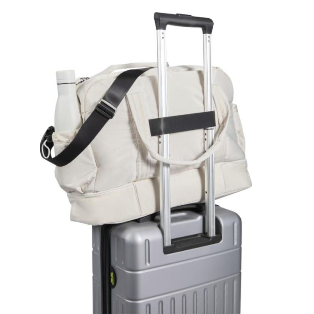 Bolsa reciclada GRS con sistema sujecion maleta ideal para viajes corporativos responsables