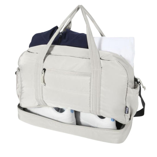 Bolsa de lona reciclada certificada GRS 30 litros con huella carbono 1,857 kg CO2e ideal para viajes y regalos corporativos sostenibles