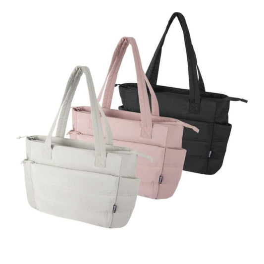 Bolsa Tote portatil reciclada utilizada como regalo corporativo sostenible con huella carbono medida ESG