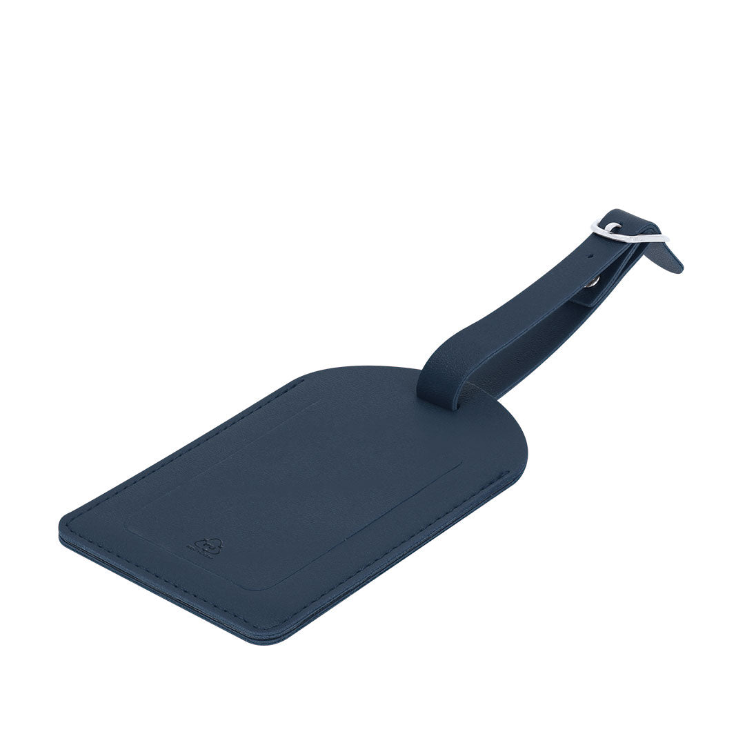 Detalle material PU reciclado en identificador de equipaje sostenible para empresas