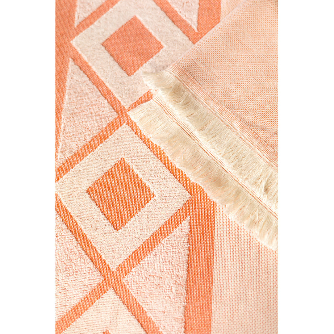 Toalla corporativa con certificación OEKO-TEX® y huella de CO₂ medida.